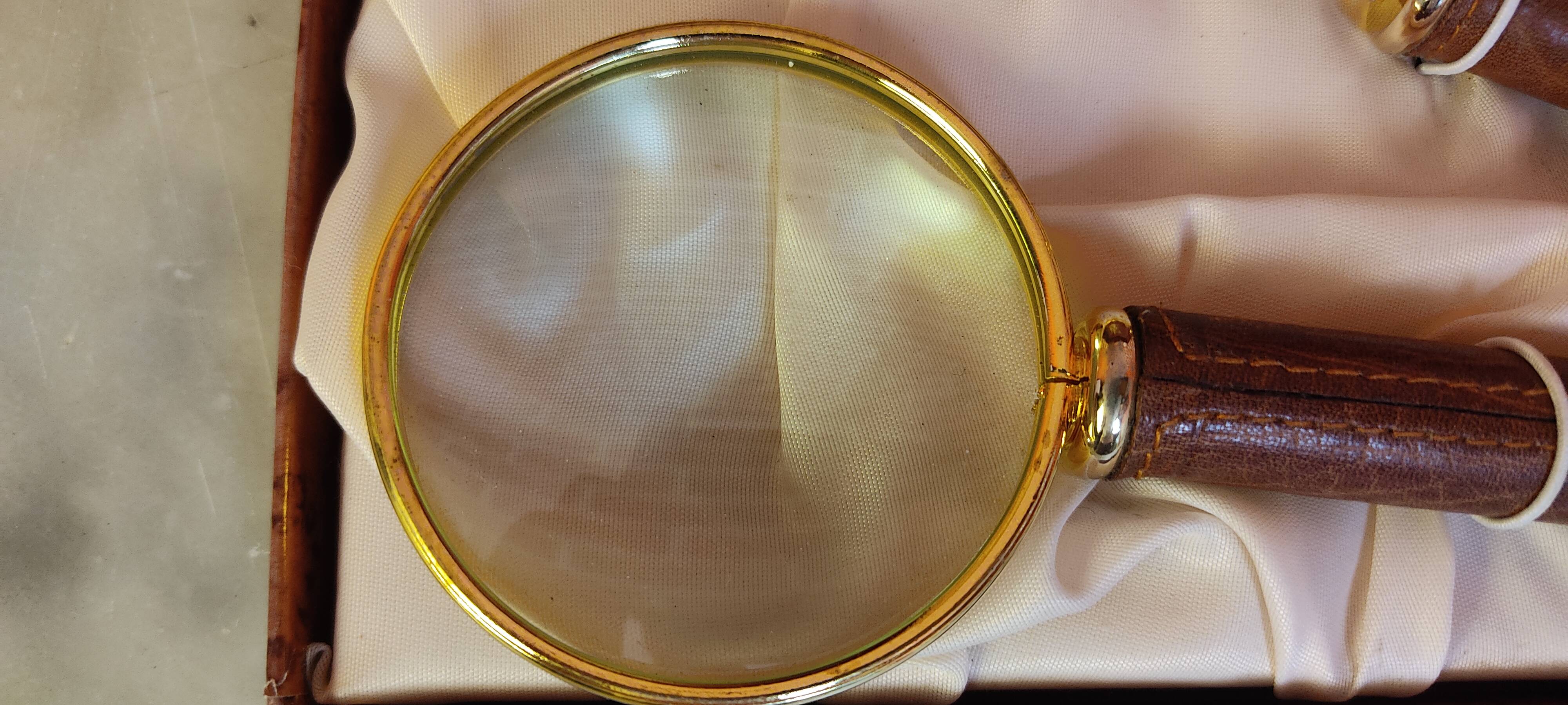 Magnifying glass and paper cutter box in leather and brass