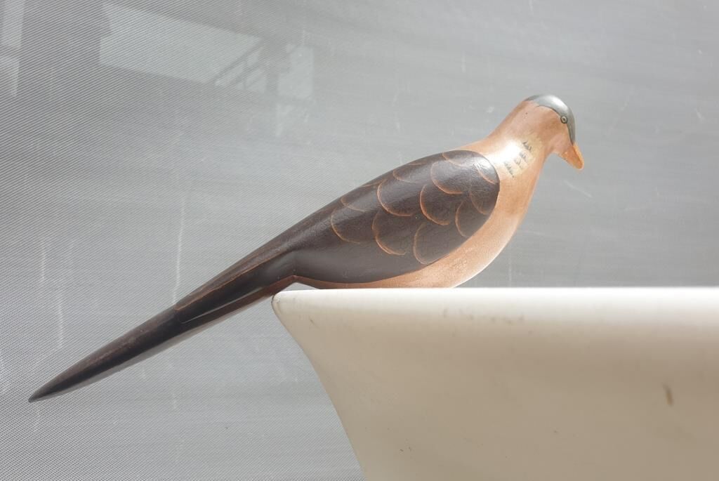 Carved painted wood dove