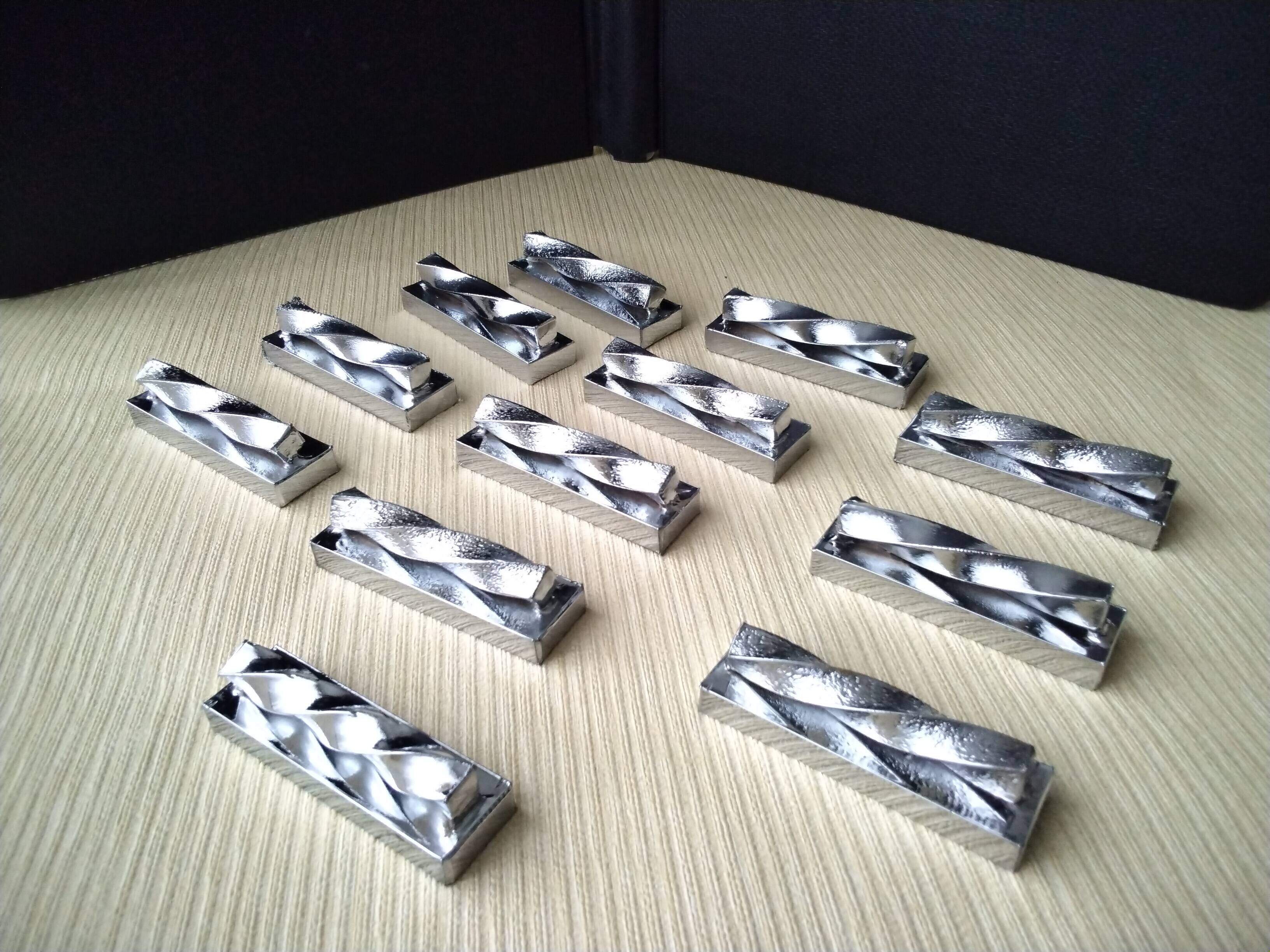 12 silver metal knife holders