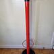 Coat rack in orange lacquered metal published by Seccose, 80s