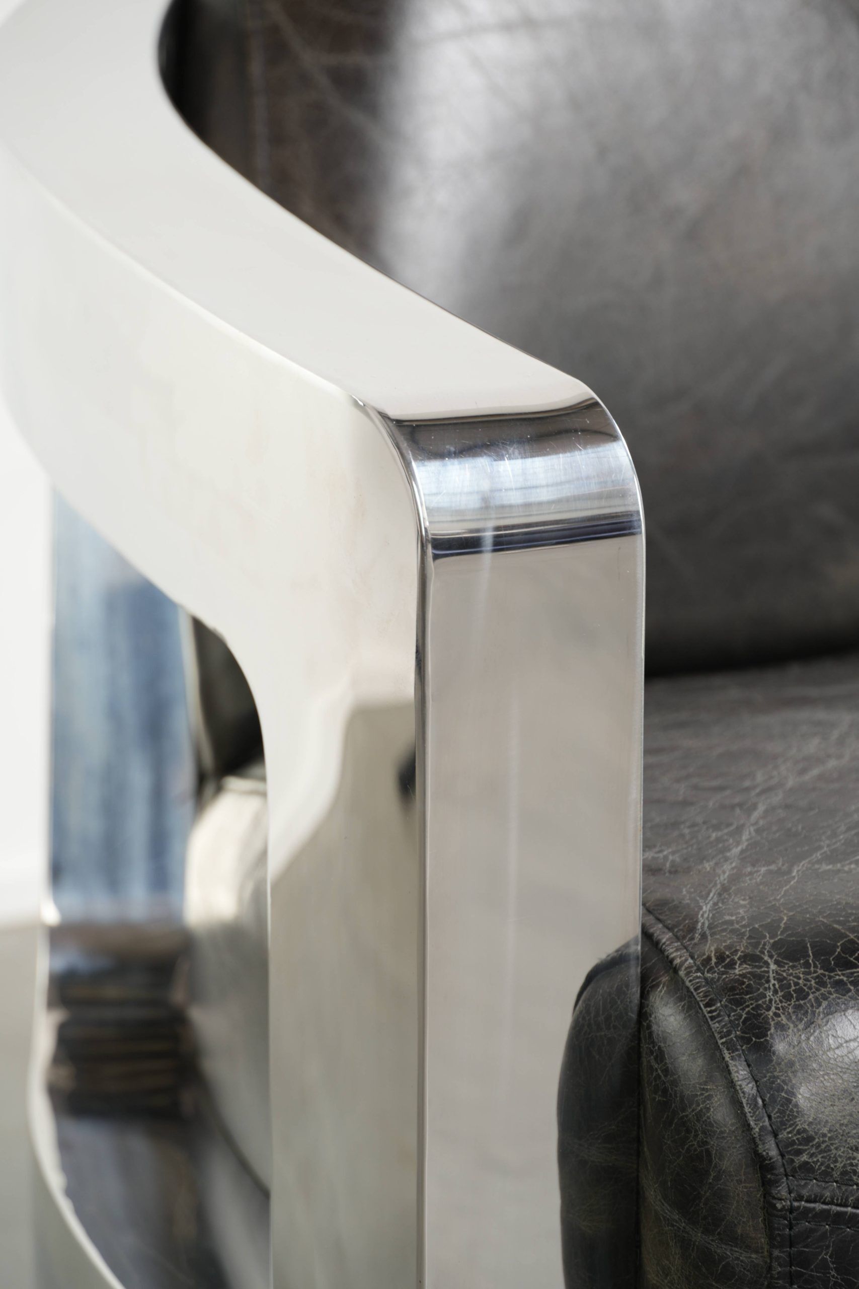 Industrial Aviator design armchair in cowhide finished with aluminium