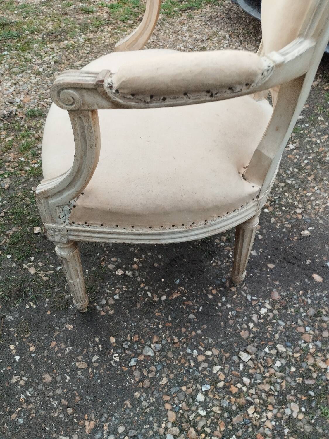 Antique armchair in Louis XVI style from the late 19th century.
