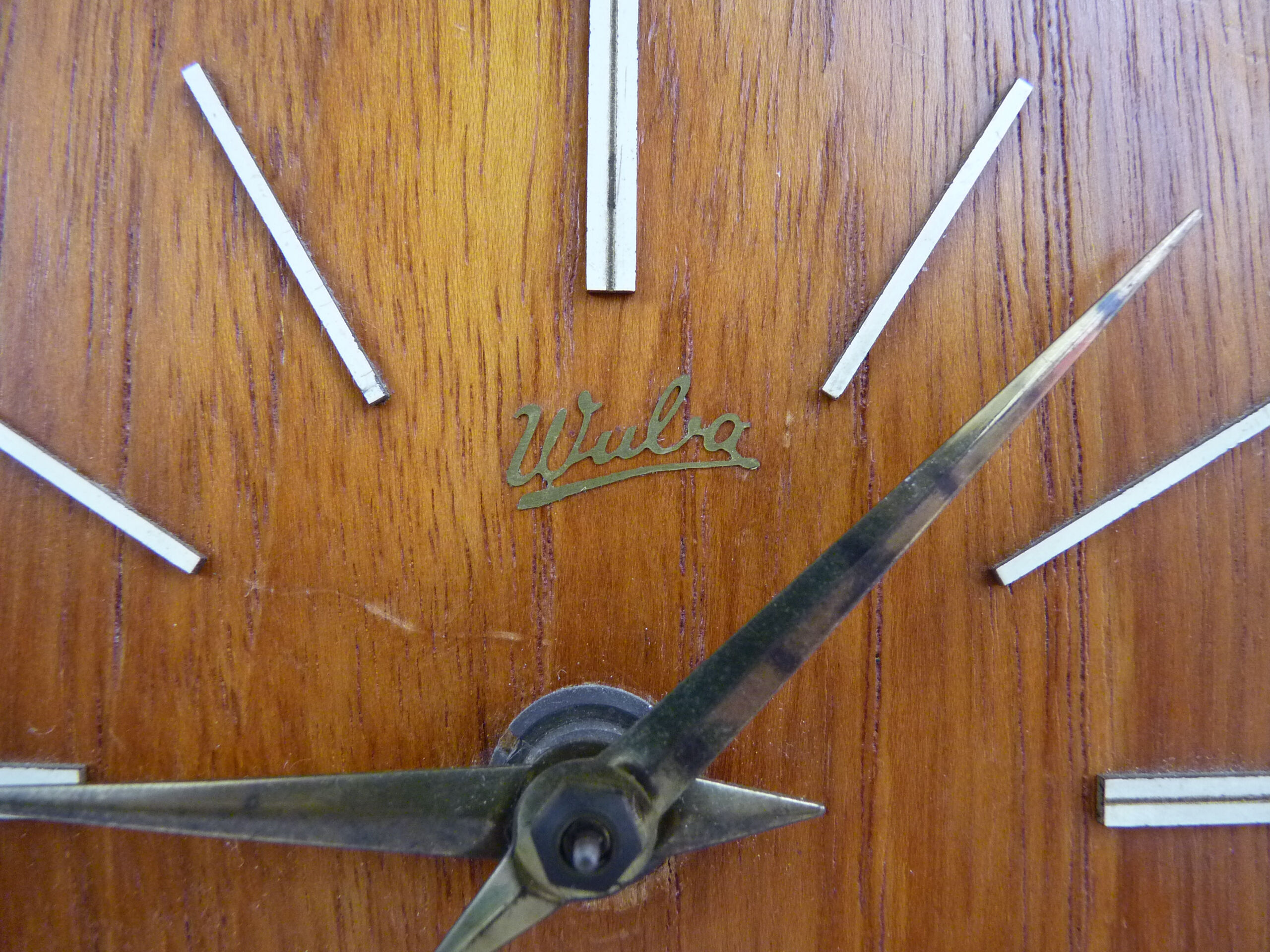 Table clock, art deco clock in Wuba Amsterdam in wood and brass. Year 50