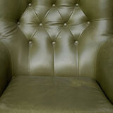 Swivel armchair in olive green leather 1970s