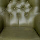 Fauteuil pivotant en cuir vert olive années 1970