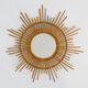 Vintage rattan sun mirror. Year 60