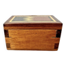 Small wooden box with red interior