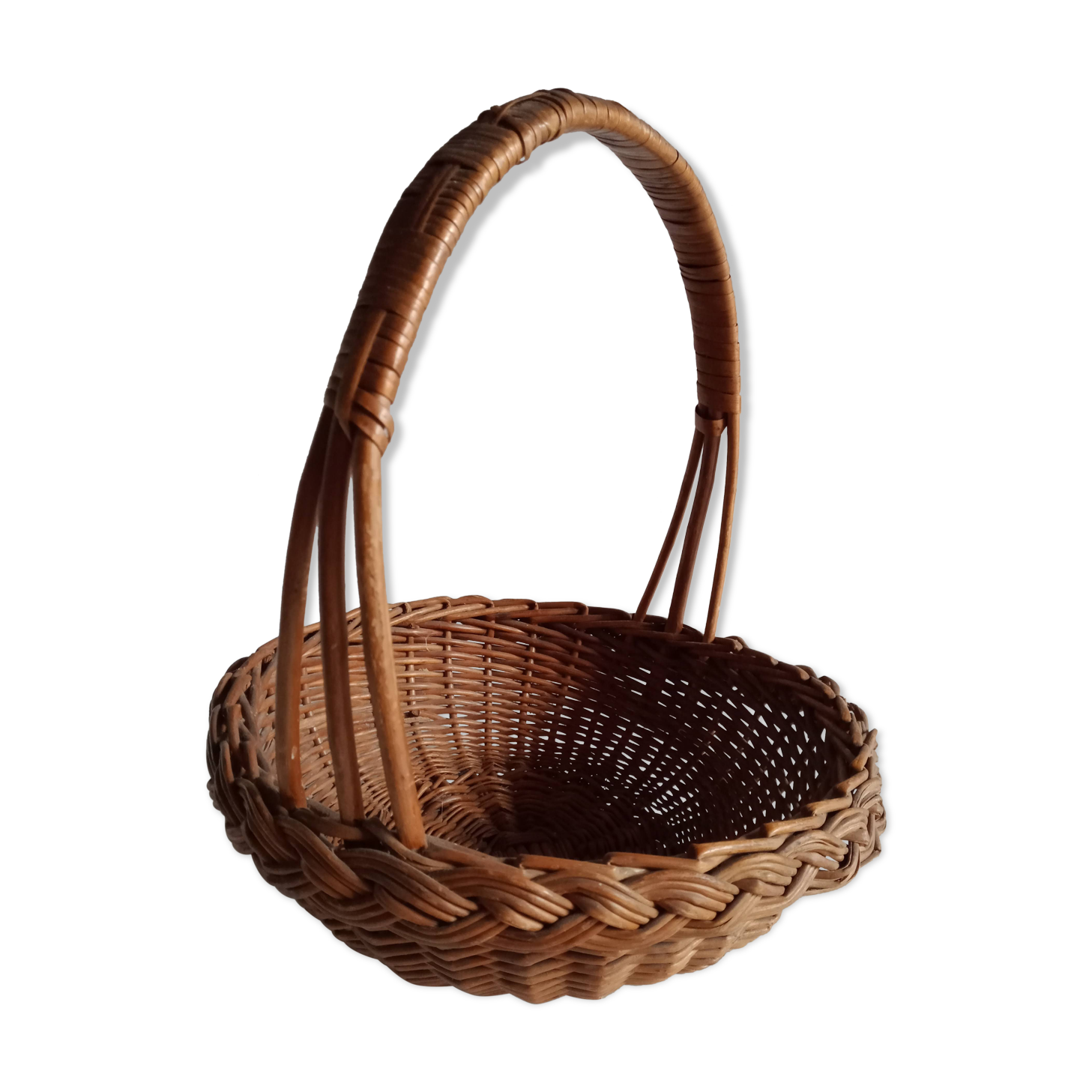 Old basket in braided wicker