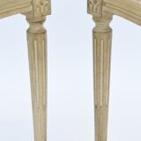 Pair of white canne and lay chairs