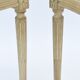 Pair of white canne and lay chairs