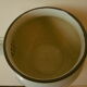 Teapot or coffee maker in old enamelled sheet metal