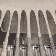 12 silver-plated dessert knives by Platil, rocaille style
