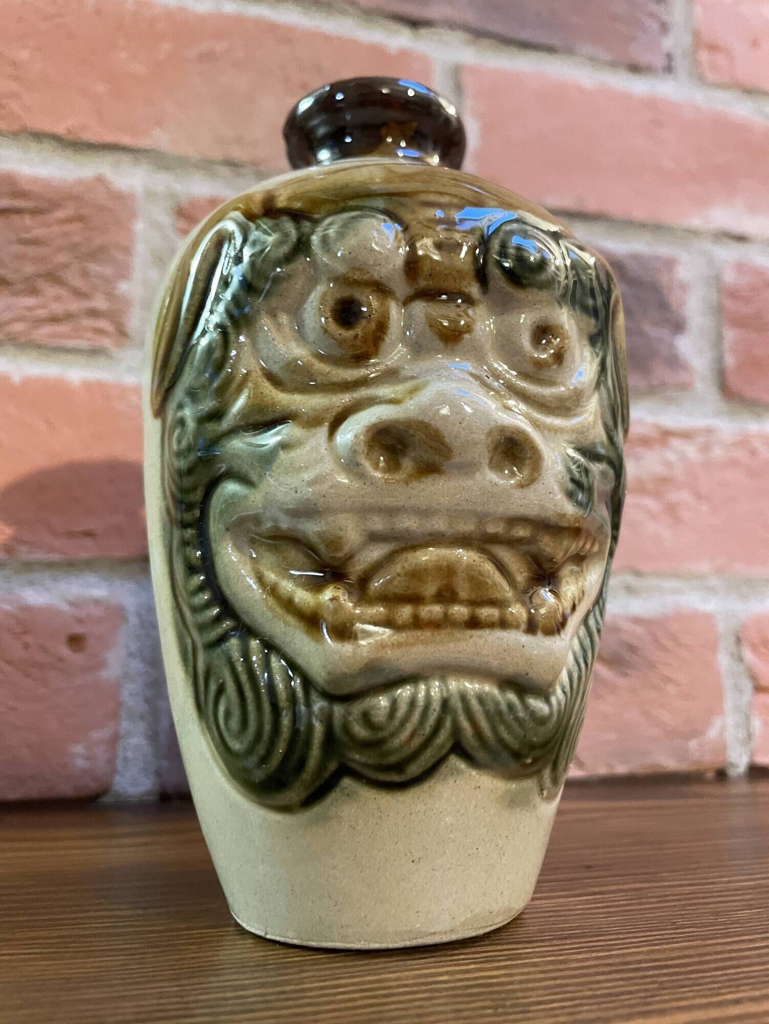 Japanese Awamori Bottle by the Helios Distillery (Okinawa) with Raised Lion and Dragon Design