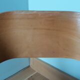 Baumann Baby Coquille children's armchair in bent wood with splayed legs.