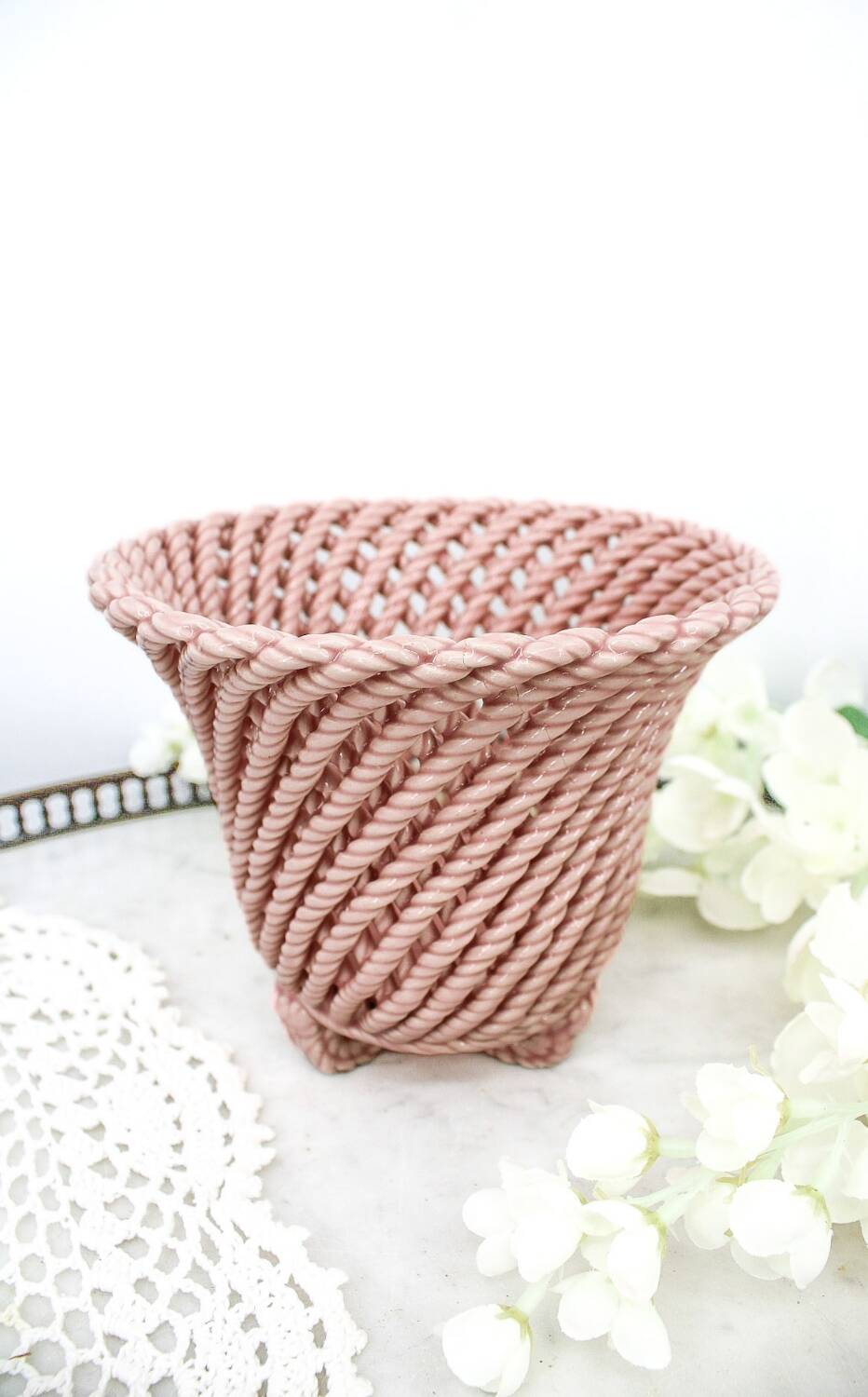 Small vintage handmade plant pot in pink woven ceramic