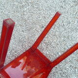 Orange design chair in polycarbonate plexiglass