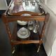 Wooden and brass rolling trolley