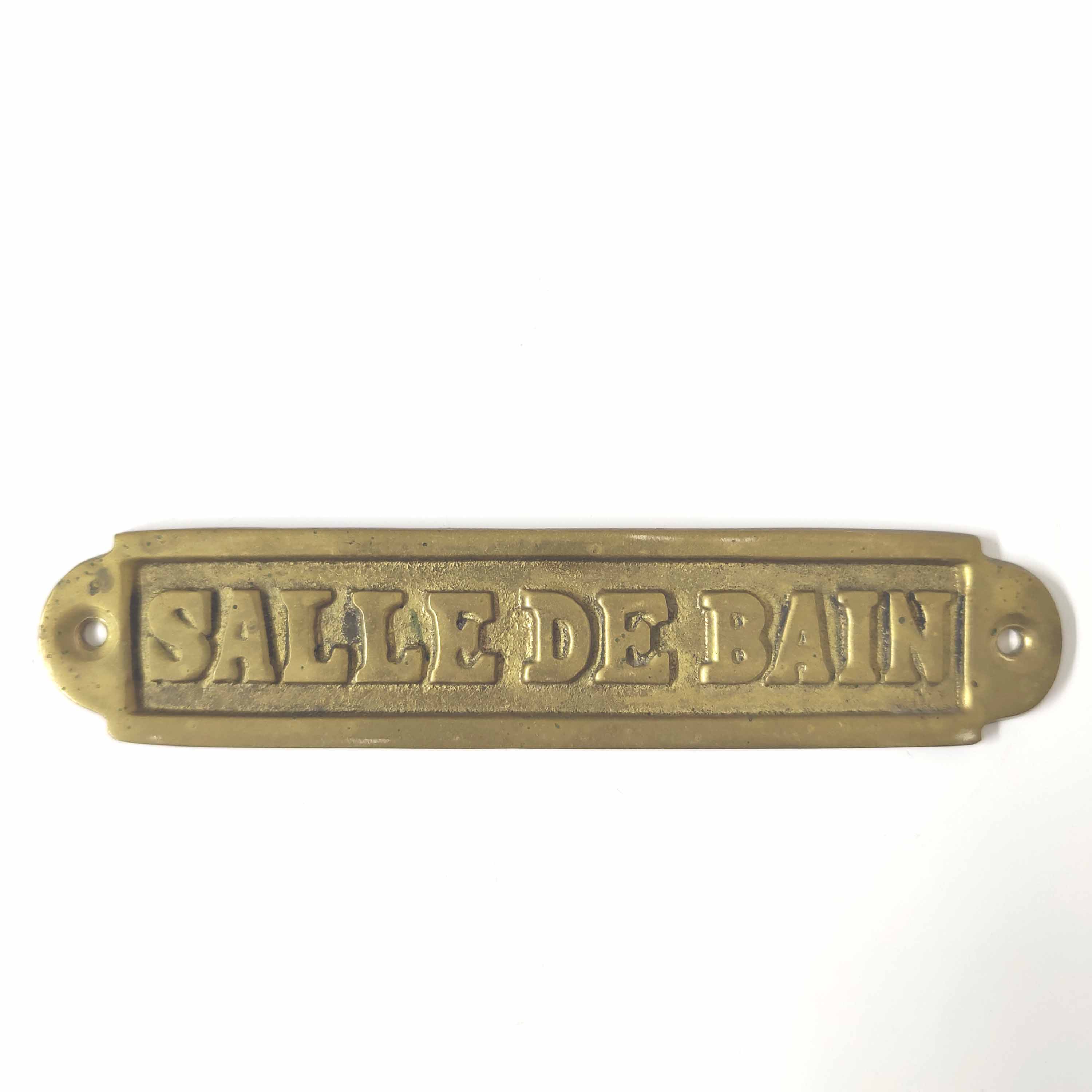 Brass bathroom door plate