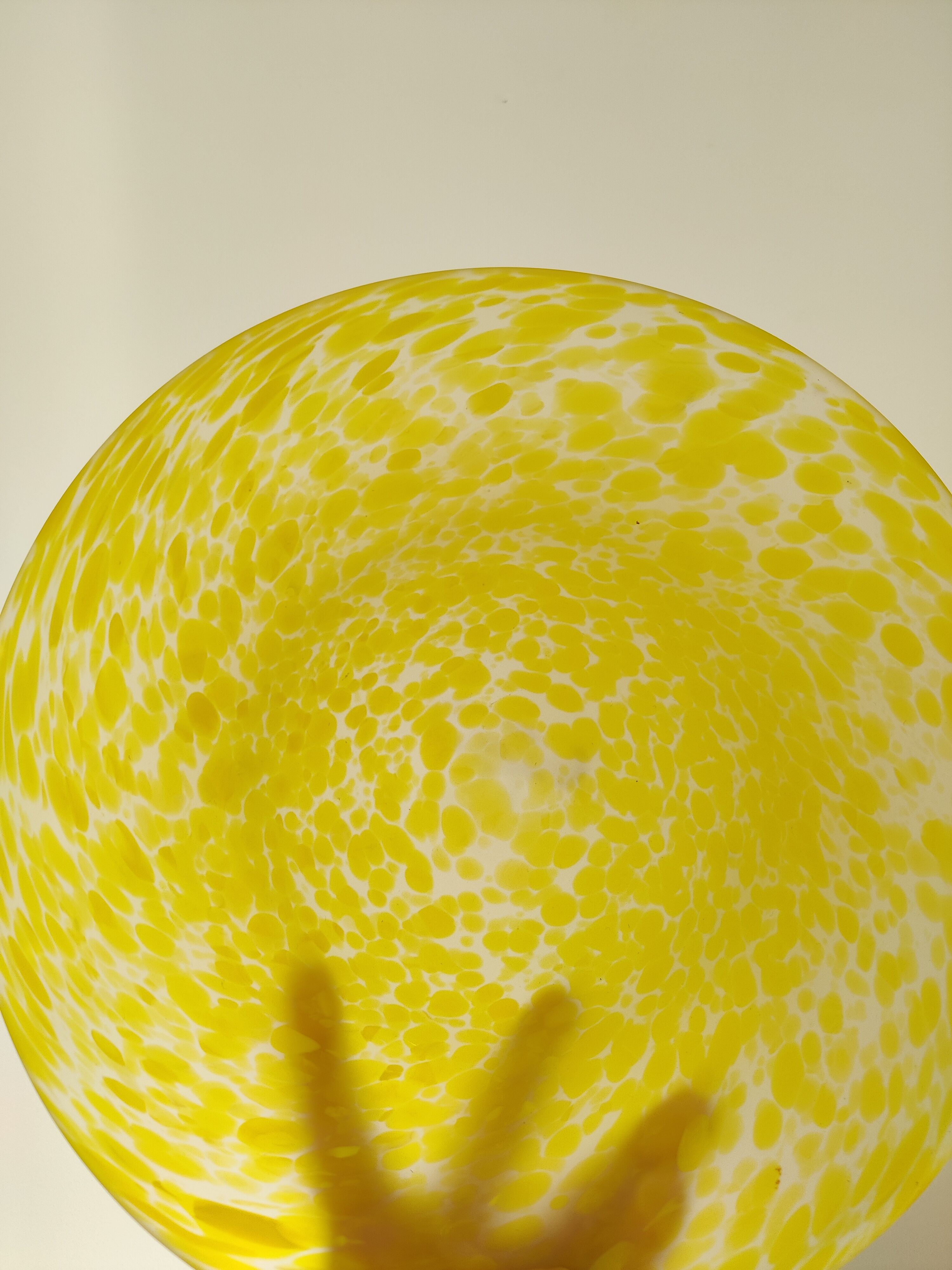 Yellow speckled frosted glass bowl