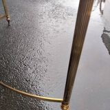 Old vintage gilded side table with marble top
