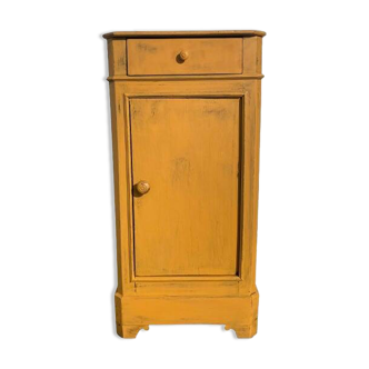 Yellow painted wooden bedside table