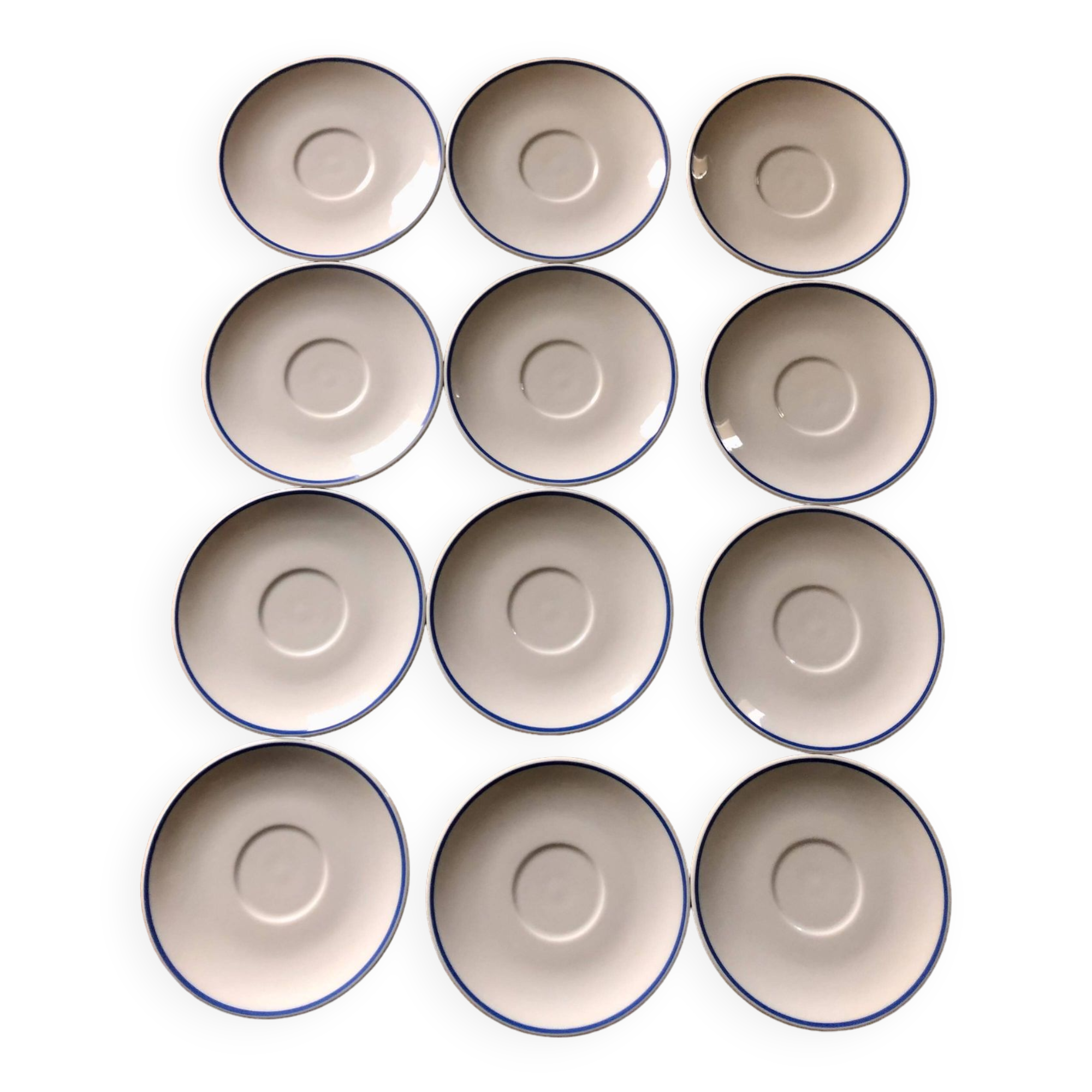 Set of 12 white porcelain saucers with blue edging