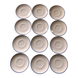 Set of 12 white porcelain saucers with blue edging