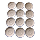 Set of 12 white porcelain saucers with blue edging