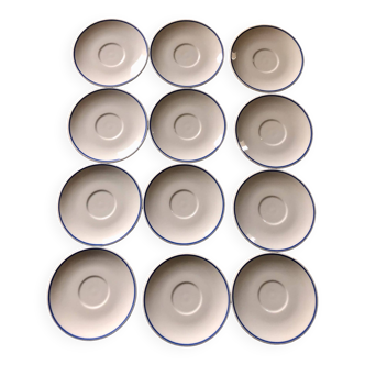 Set of 12 white porcelain saucers with blue edging