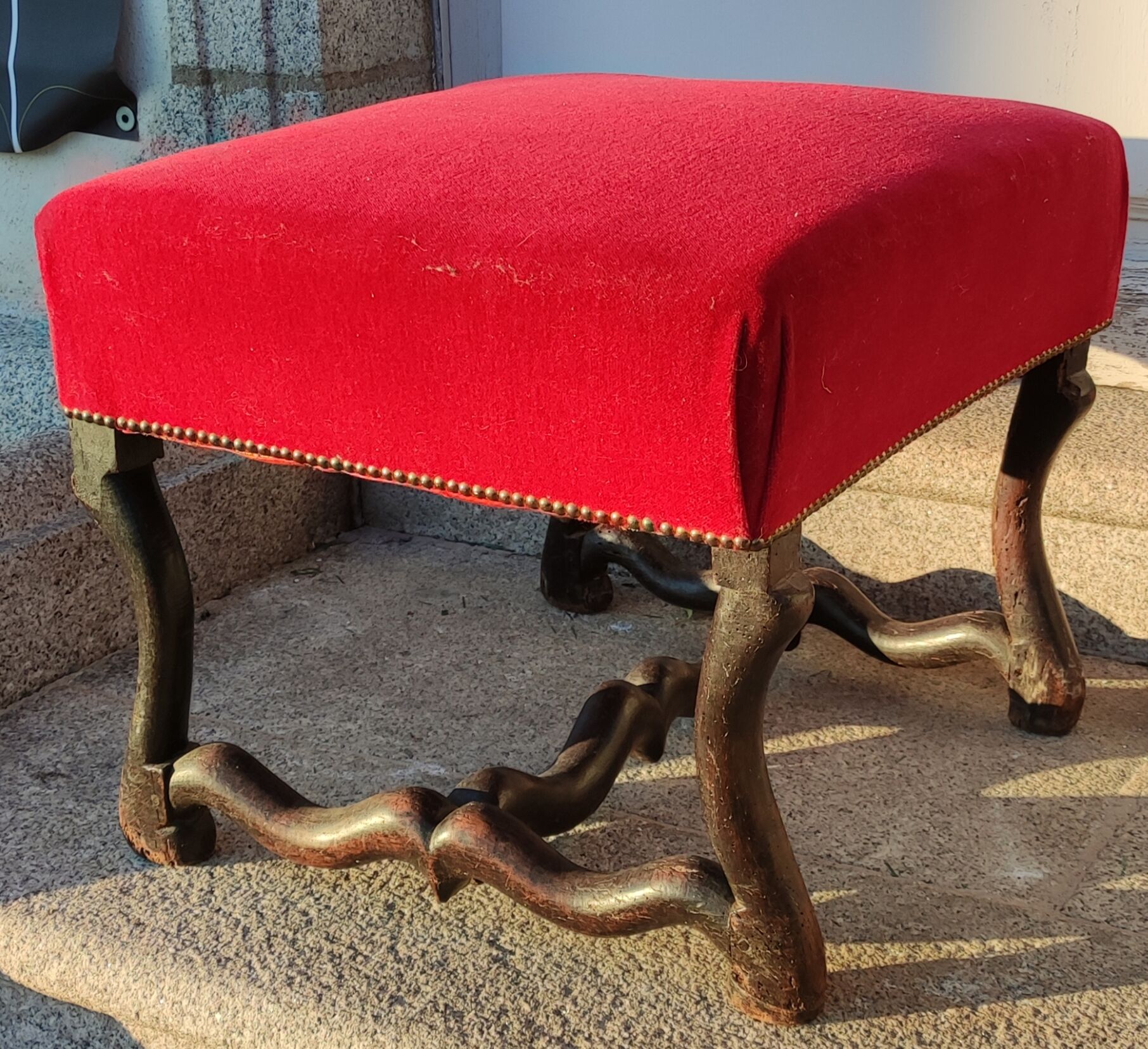 Old footrest, pouf red velvet