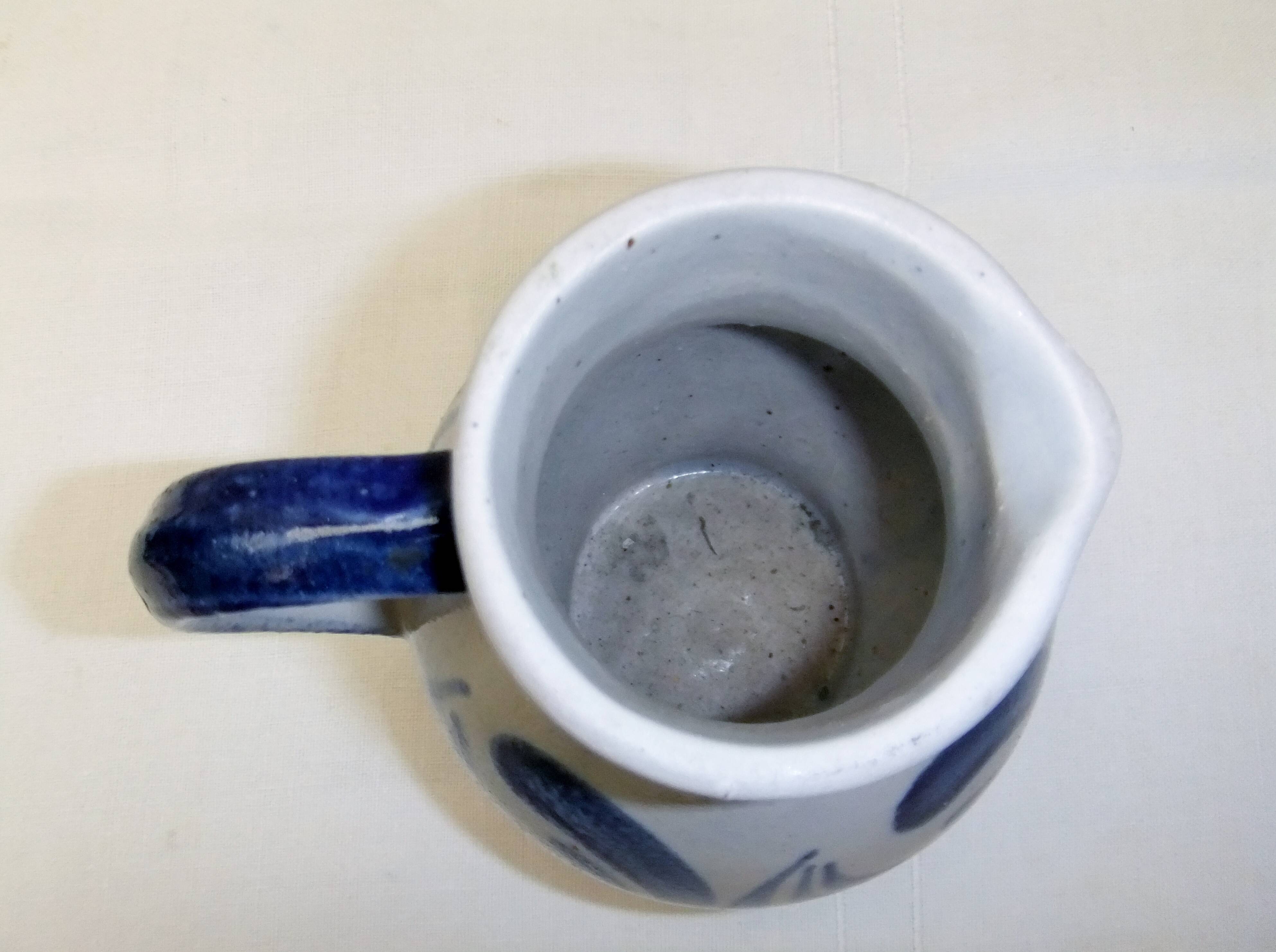 Handmade glazed stoneware pitcher with Handarbeit inscription