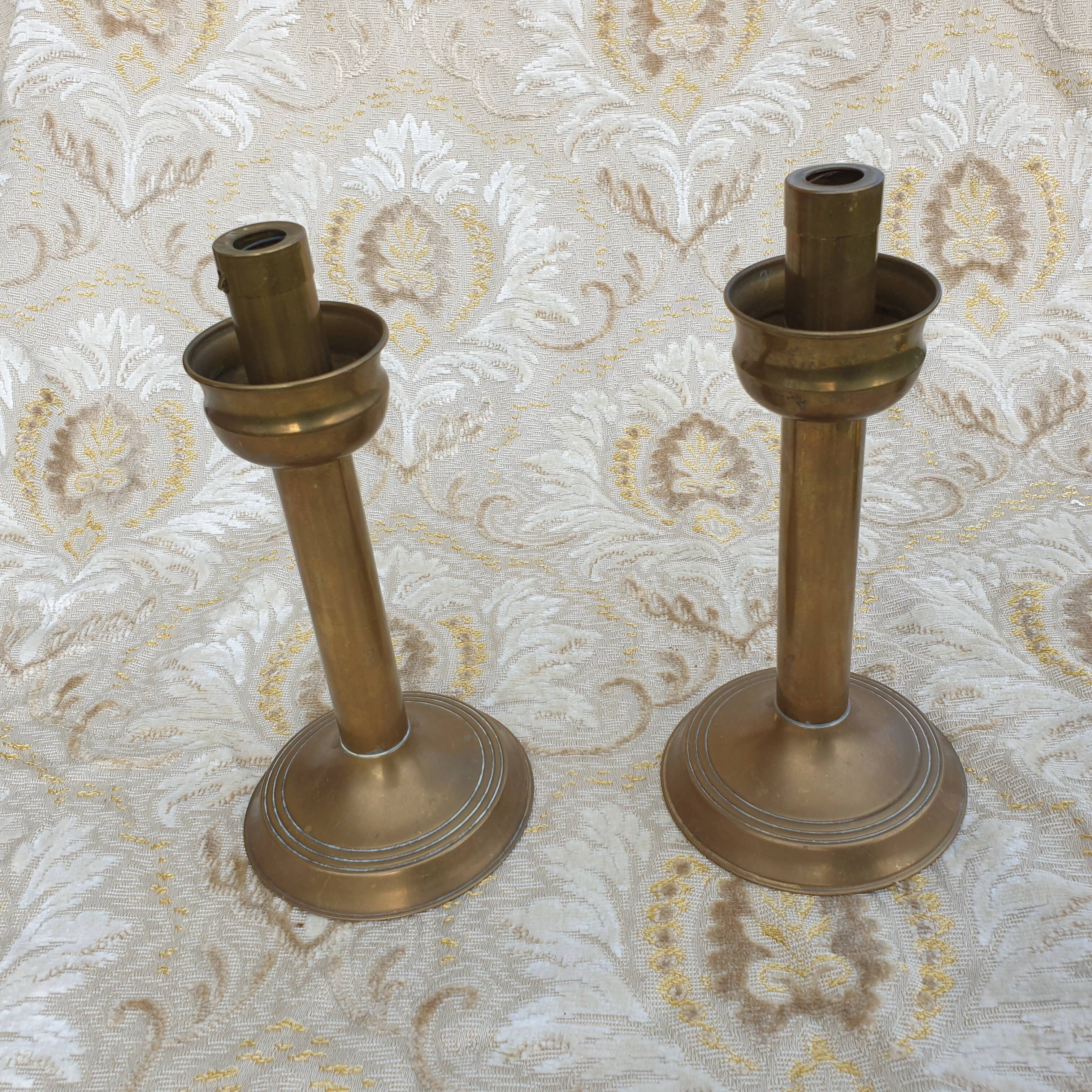 Pair of old brass candlesticks