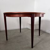 Round teak table with Scandinavian design extensions from the 60s vintage