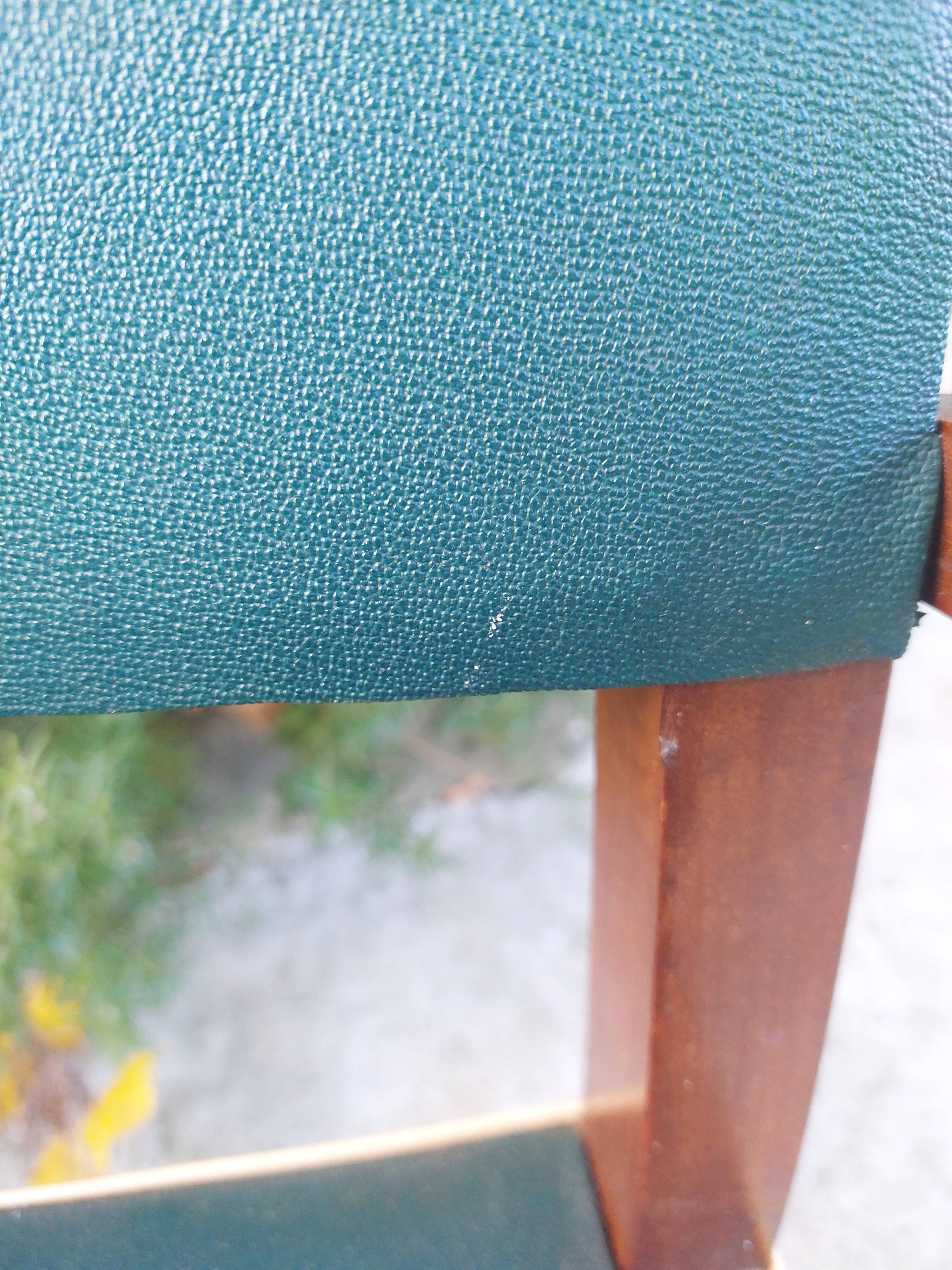 pair of dark green bridge armchairs
