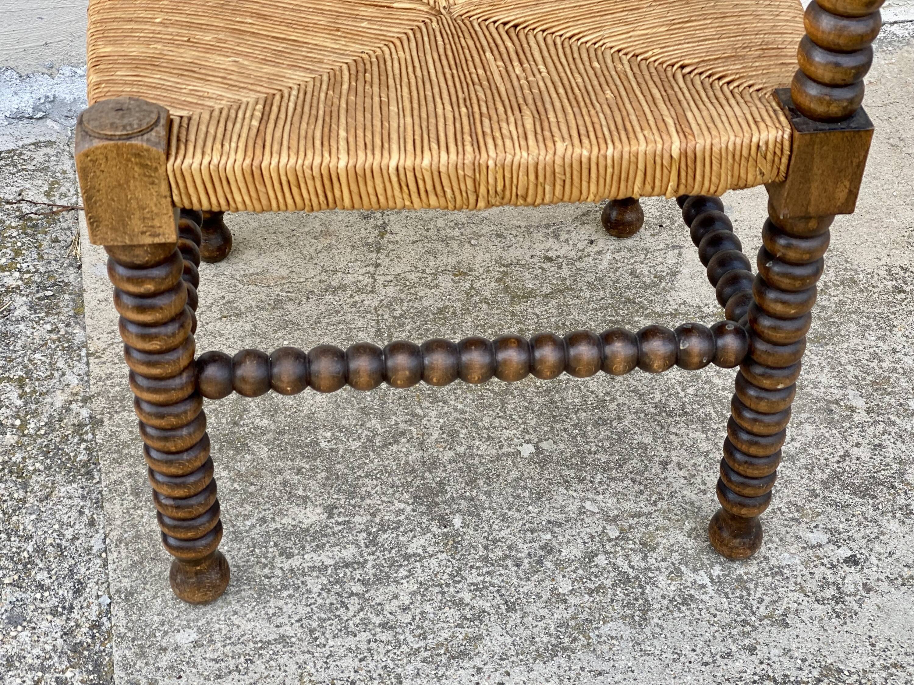 Art Deco turned wood straw corner armchair