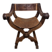 Rare Curule Chair in Carved Wood and Repoussé Leather – Signed P.C. SCAFA Naples