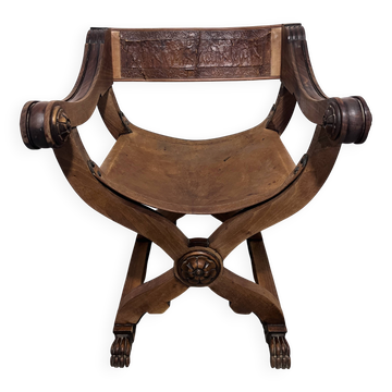 Rare Curule Chair in Carved Wood and Repoussé Leather – Signed P.C. SCAFA Naples
