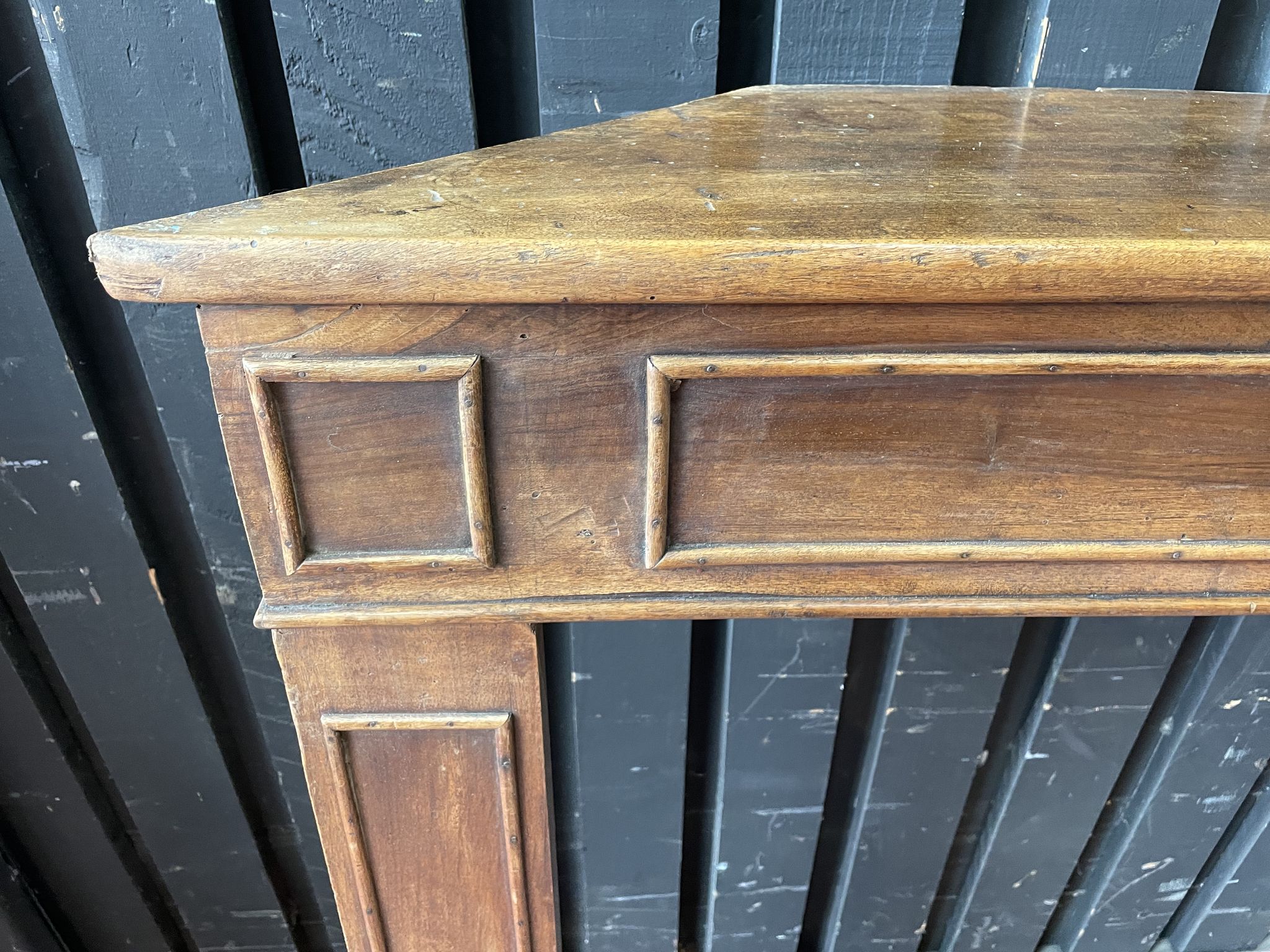 Front or frame or facade of fireplace of the nineteenth century in walnut wood carved by hand.