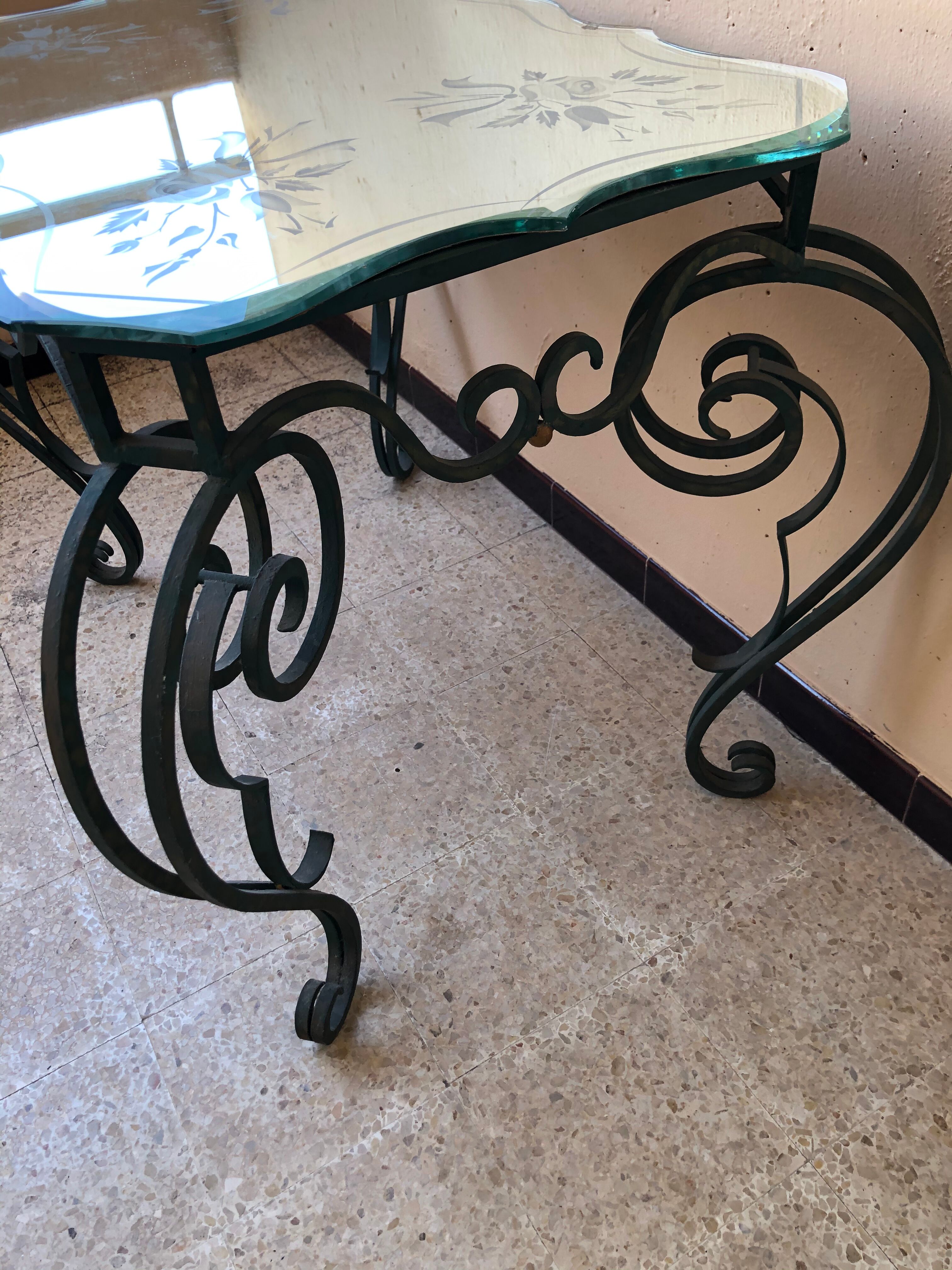 Wrought iron and engraved mirror