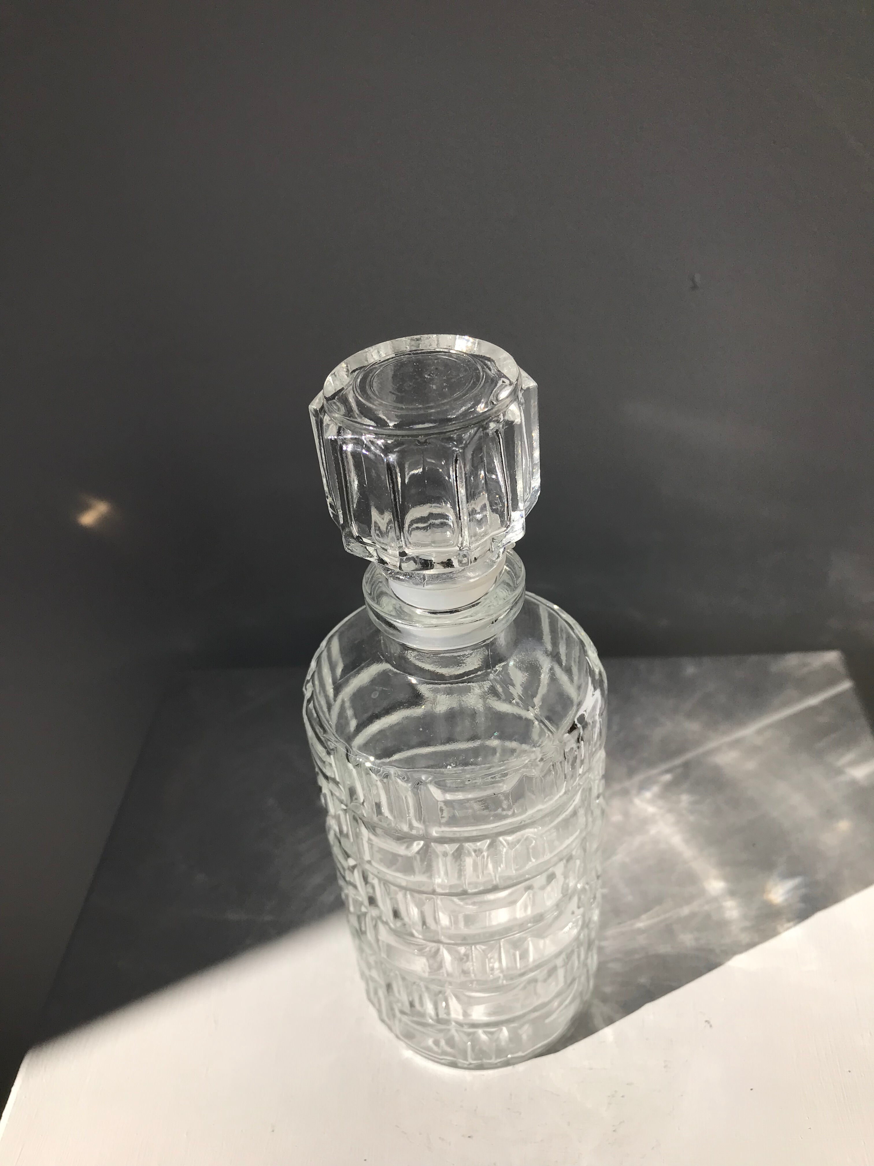 Vintage whisky decanter in glass