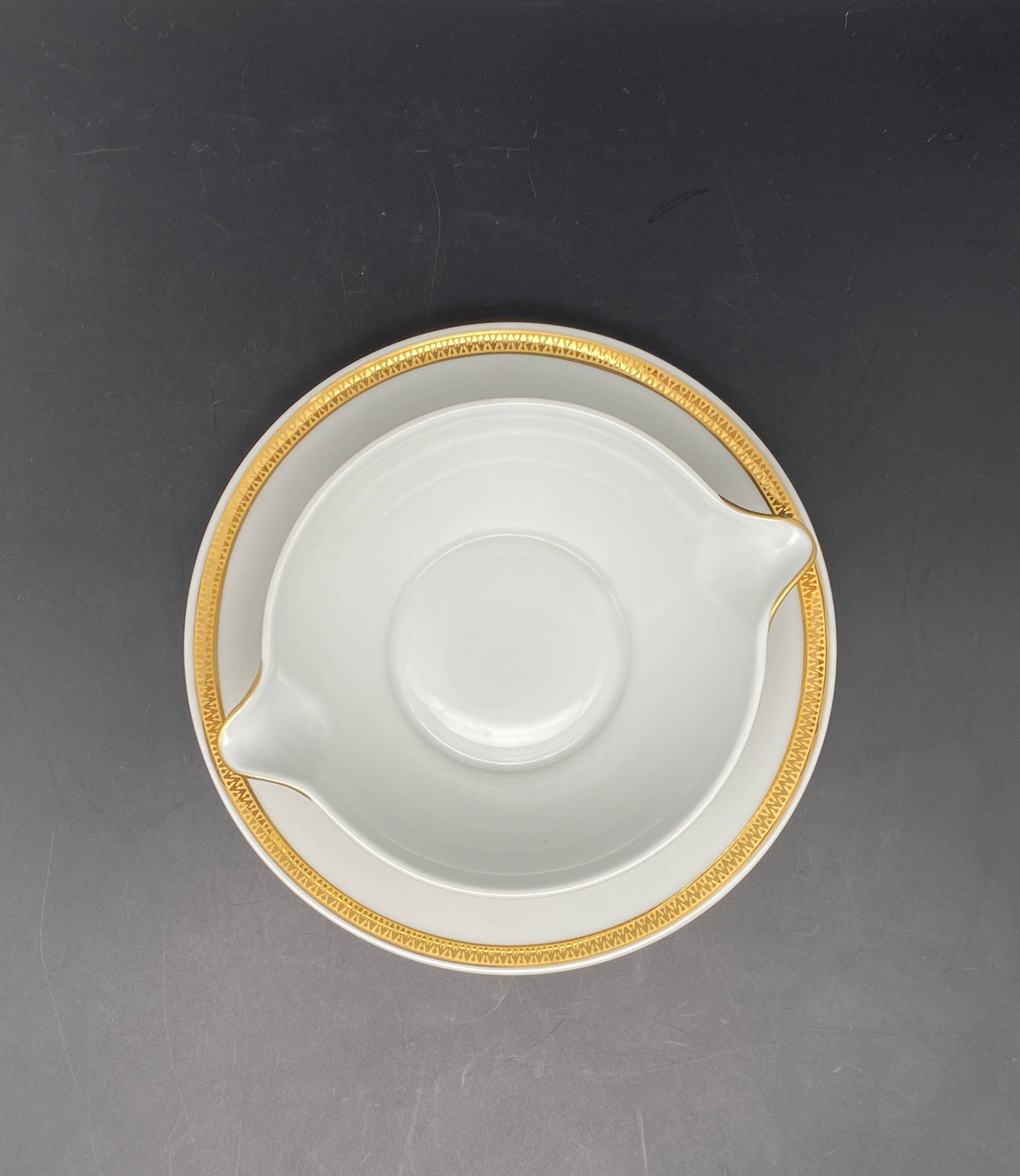 Limoges porcelain gravy boat with gold edging