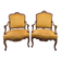 Pair of faux Louis XV armchairs in fully carved walnut