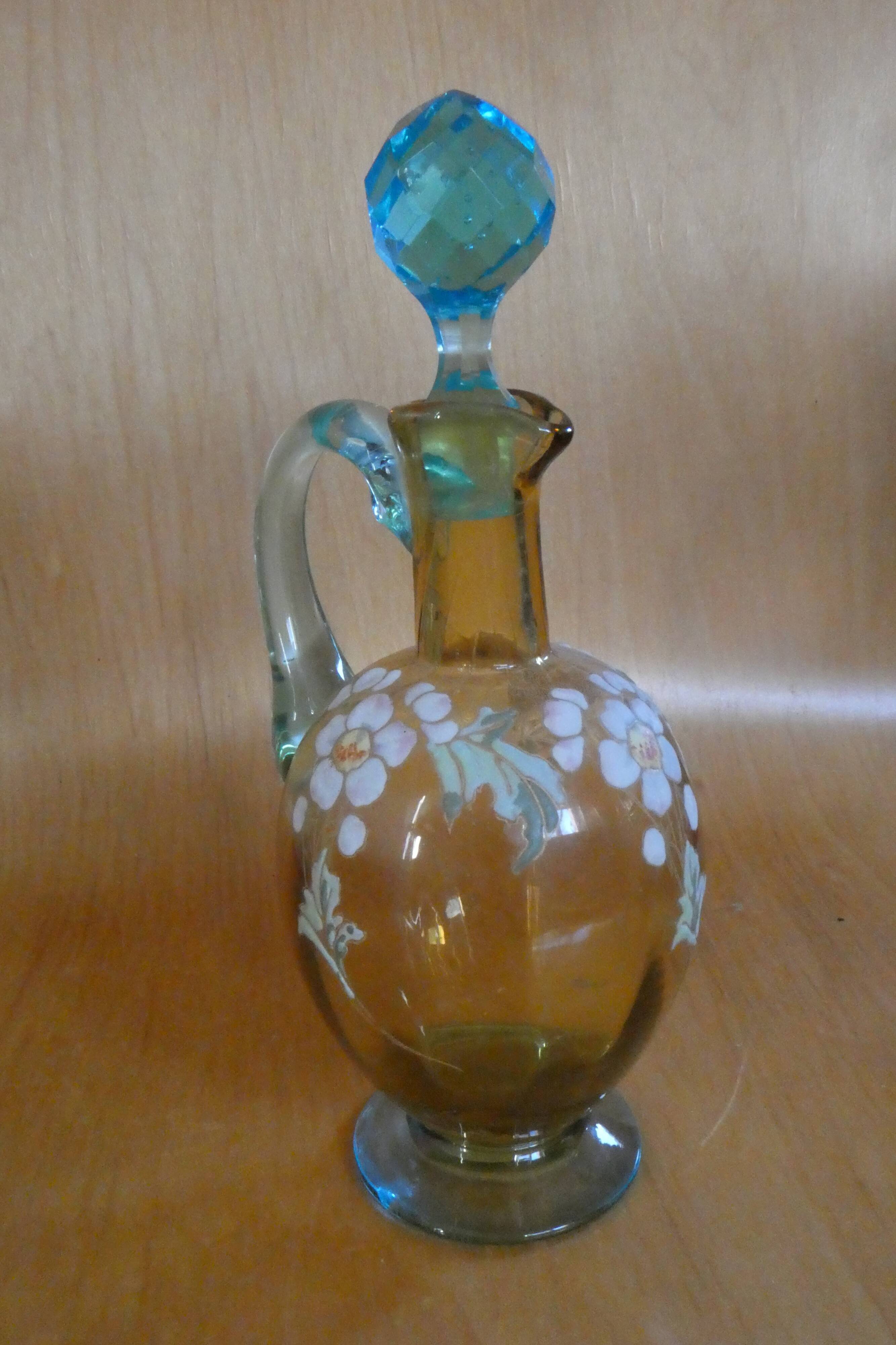 Enamelled liqueur decanter with floral decoration