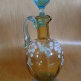 Enamelled liqueur decanter with floral decoration