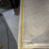 Antique wood and marble kitchen sideboard with carved backsplash