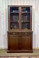 English walnut two-body library from the early 20th century.