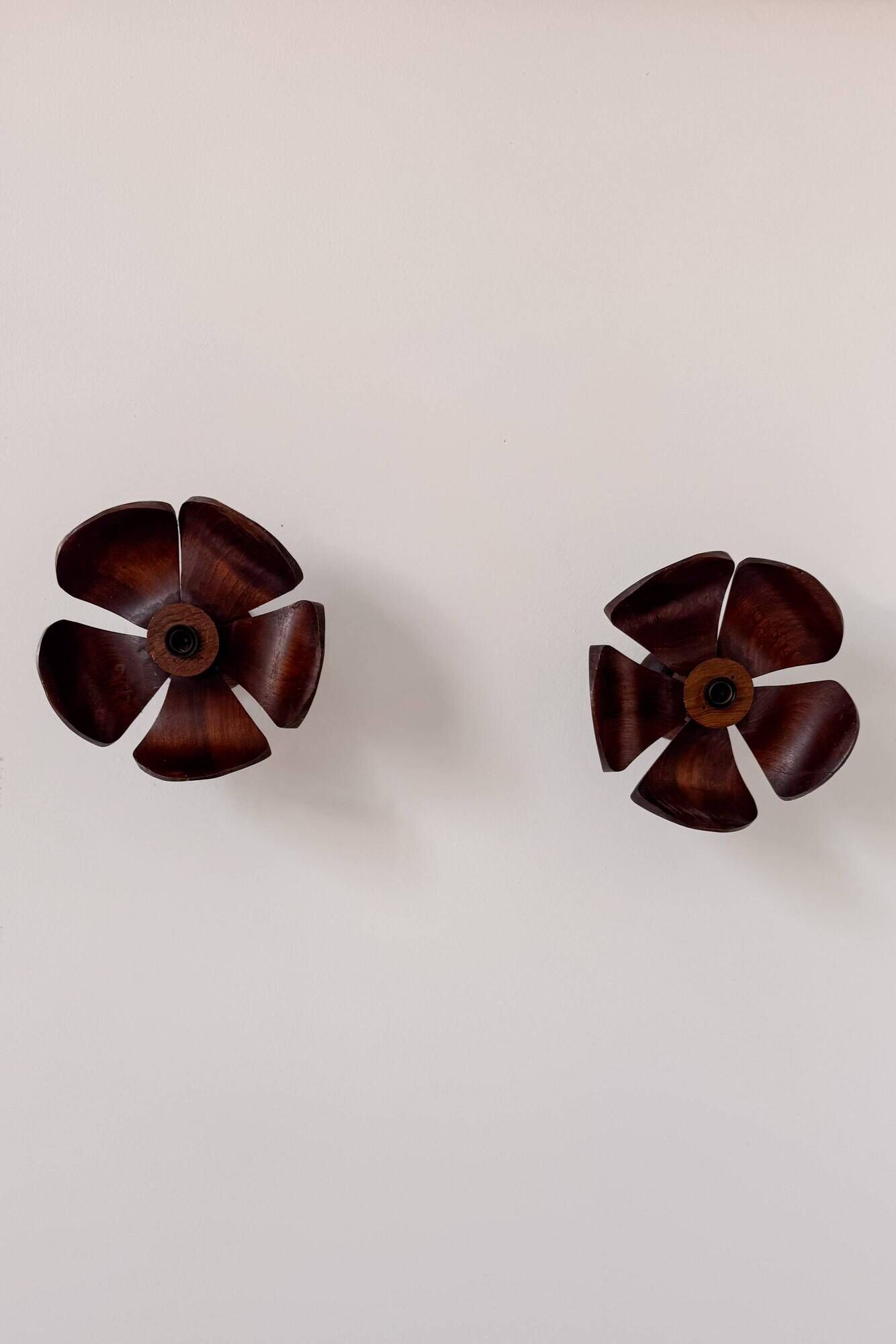 Vintage wall sconces, carved wood with floral pattern, France, 1960.