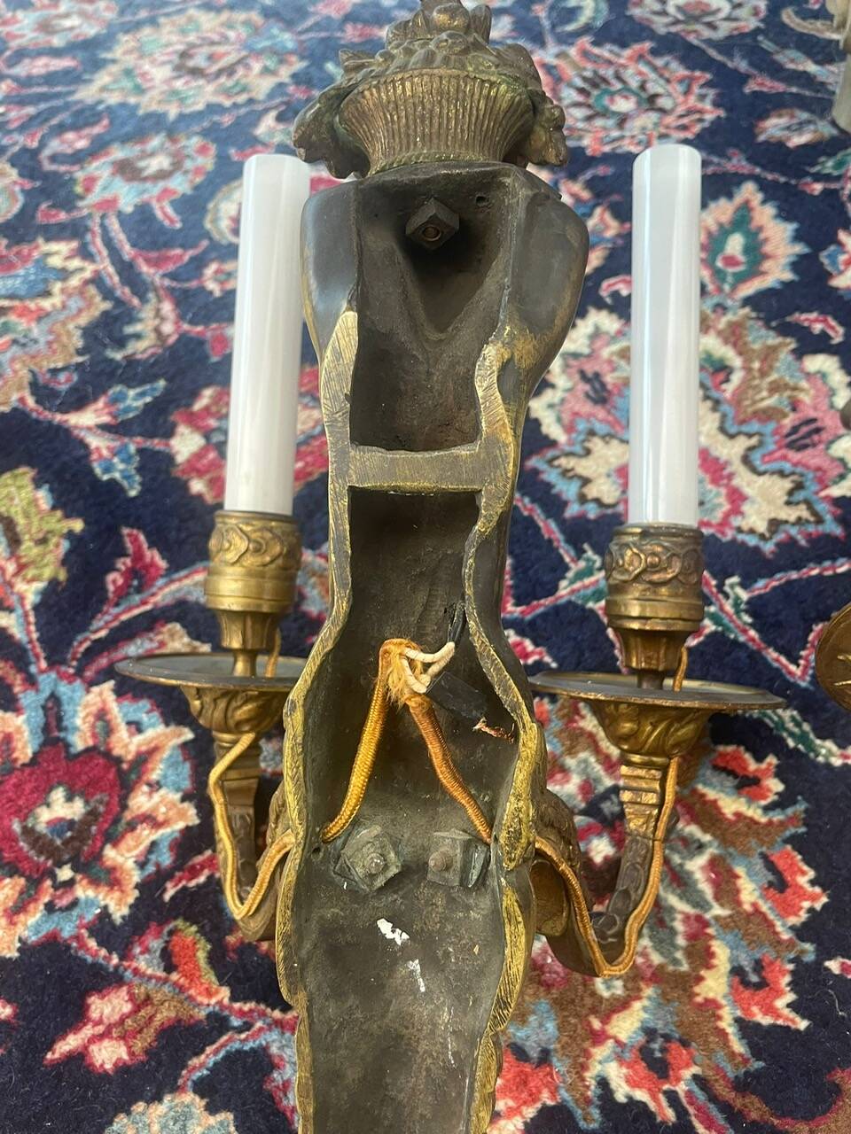 Pair of gilt bronze wall sconces with caryatid and Atlante decoration, 18th century.