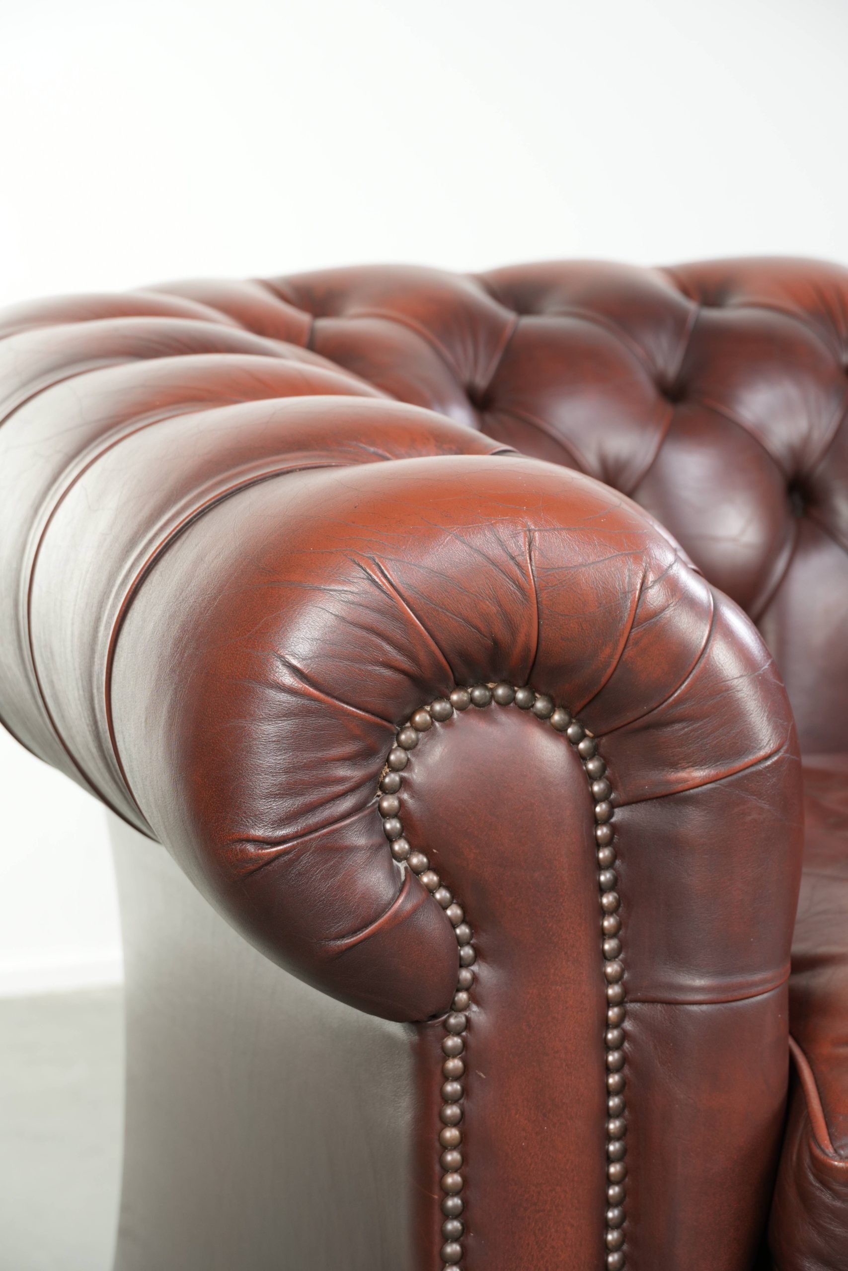 Cowhide Chesterfield armchair in a classic English style