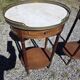 Pair of Louis XVI style bedside tables in mahogany, with marble tops.